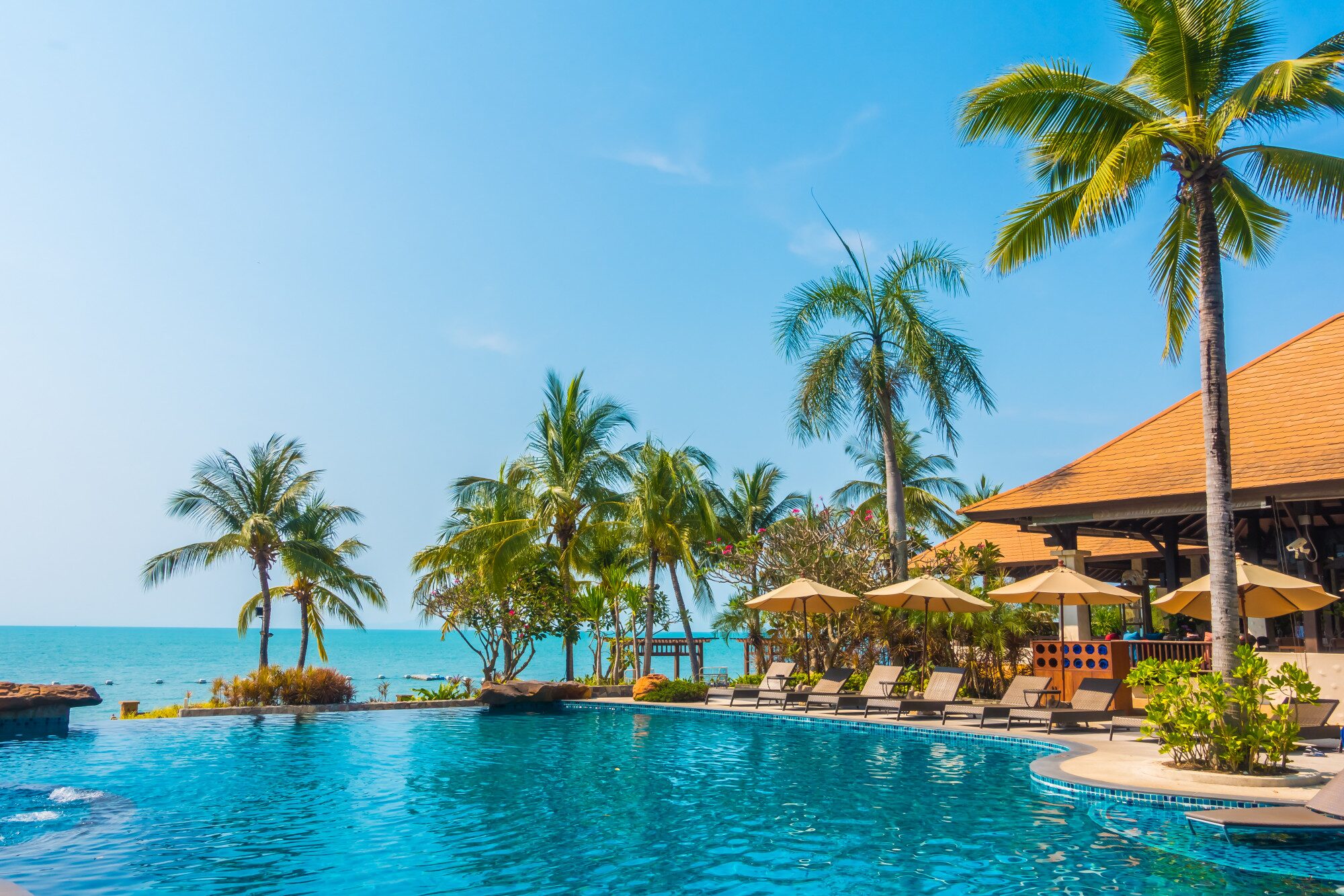 Aerial view of modern seaside properties lining Bai Dai coast, illustrating the scale of beach resorts in Cam Ranh.