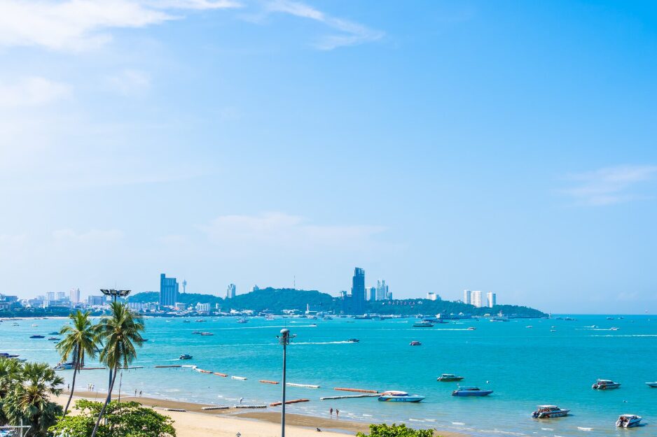 Tourists kayaking on calm turquoise waters near the beach, showcasing adventurous things to do in Cam Ranh.