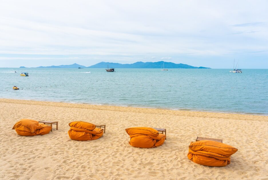 Pristine white sand shoreline with turquoise water at Bai Dai, showcasing the natural beauty of Cam Ranh beaches.