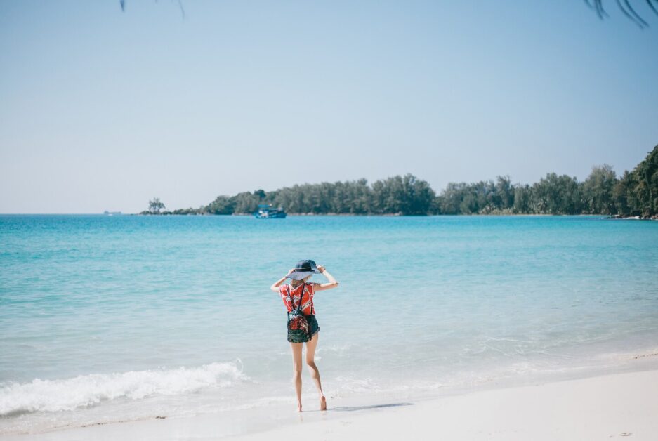 Calm crystal-clear sea with gentle waves and blue skies, highlighting the peaceful atmosphere of Cam Ranh beaches.