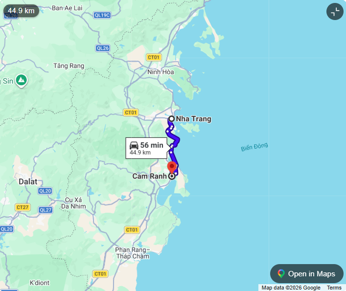 Travelers arriving at the airport terminal with luggage, showcasing the main gateway for how to get to Cam Ranh.